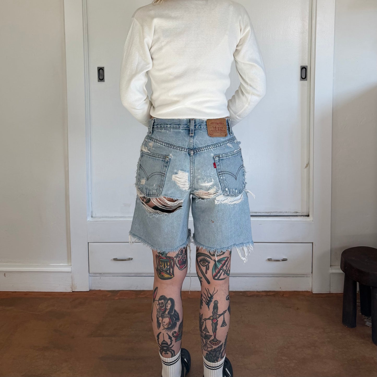 Vintage 1990s Levis 550 Distressed Denim Light Wash Shorts