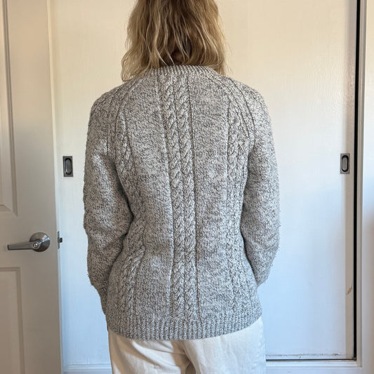 Vintage handmade knitted sweater in a light grey blue