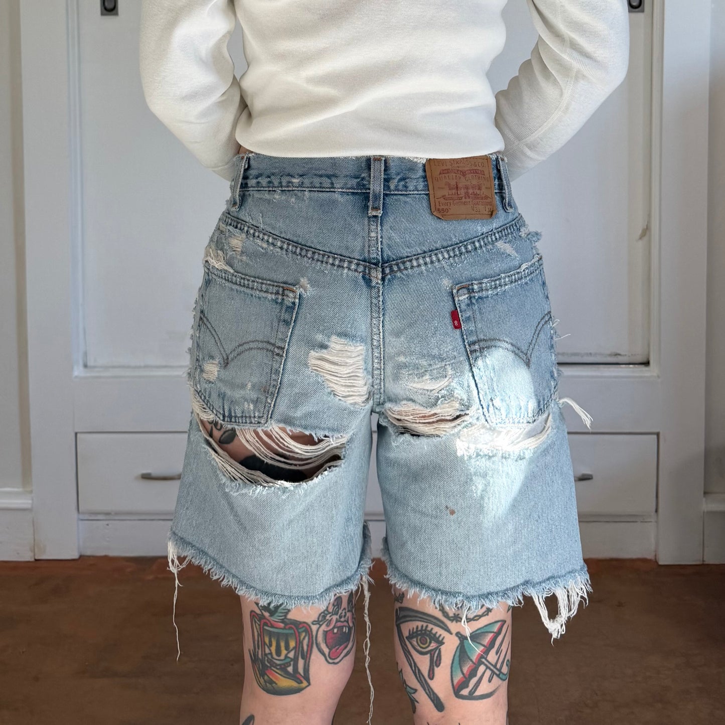 Vintage 1990s Levis 550 Distressed Denim Light Wash Shorts