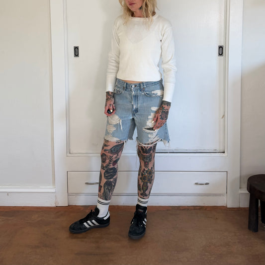 Vintage 1990s Levis 550 Distressed Denim Light Wash Shorts