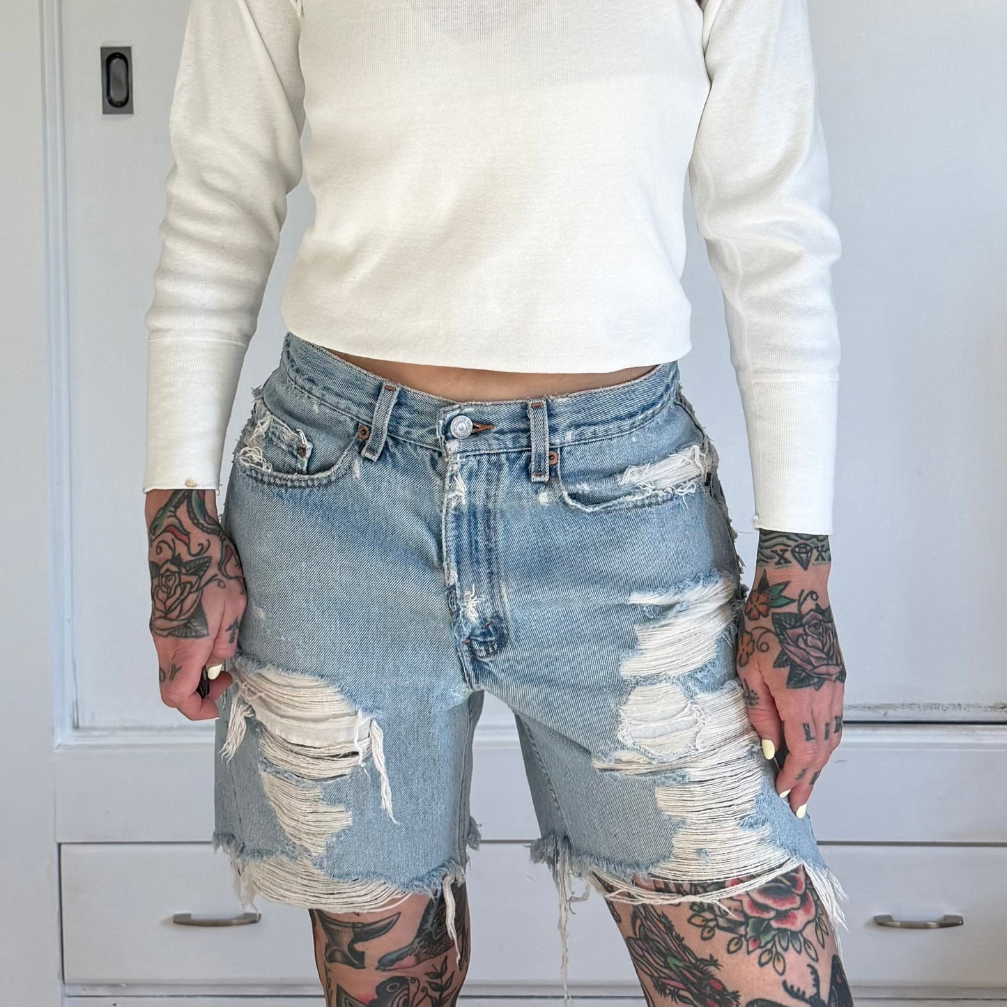 Vintage 1990s Levis 550 Distressed Denim Light Wash Shorts