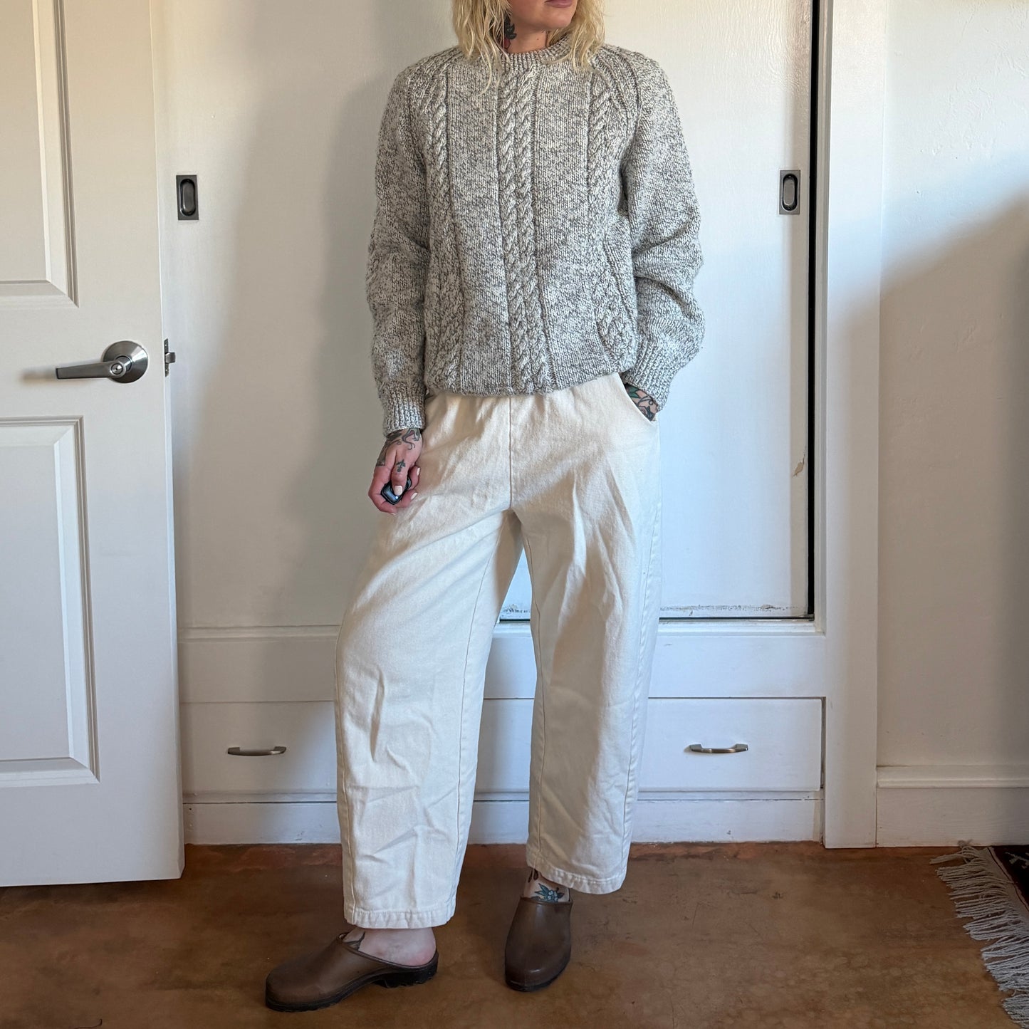 Vintage handmade knitted sweater in a light grey blue