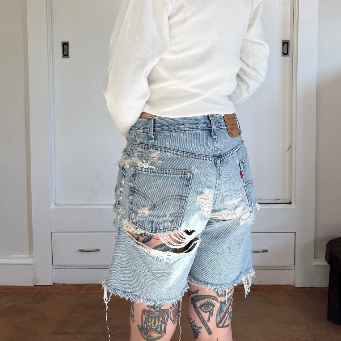 Vintage 1990s Levis 550 Distressed Denim Light Wash Shorts