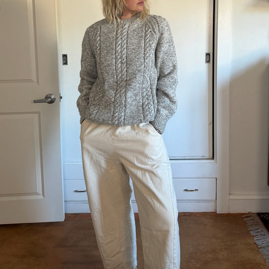 Vintage handmade knitted sweater in a light grey blue